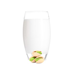 Image of Nut milk in glass and pistachios isolated on white