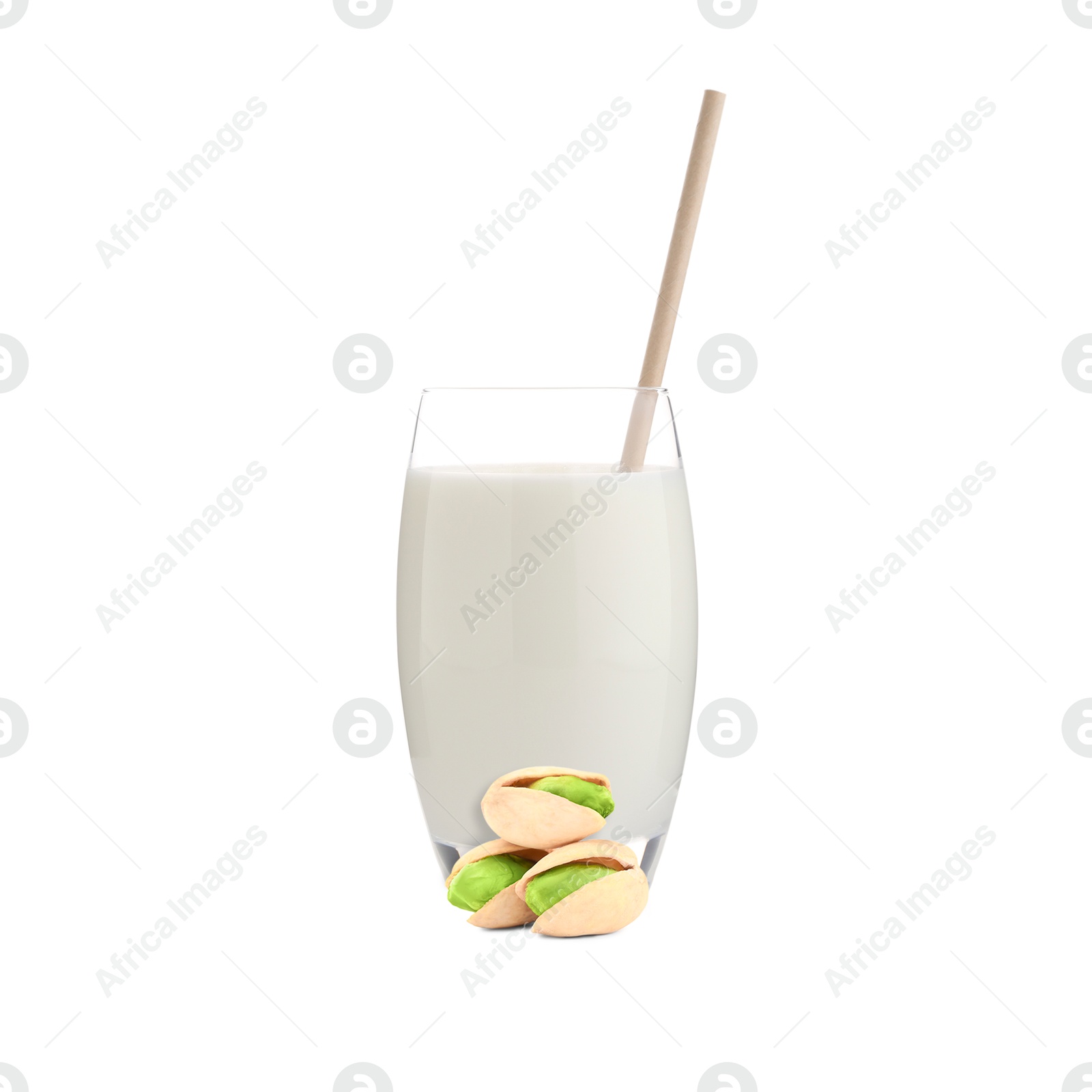 Nut milk in glass and pistachios isolated on white Image of Nut milk in glass and pistachios isolated on white