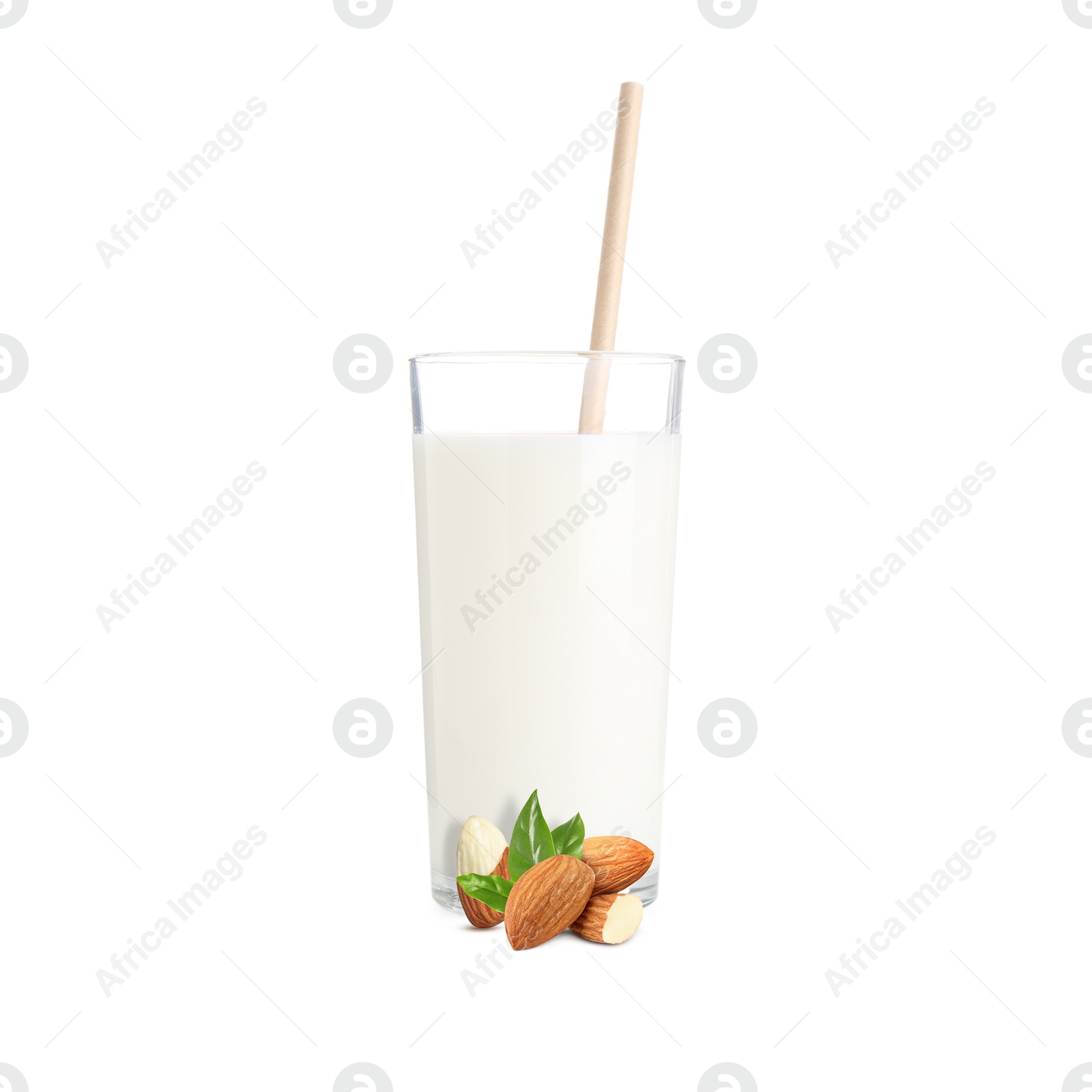 Nut milk in glass and almonds isolated on white Image of Nut milk in glass and almonds isolated on white