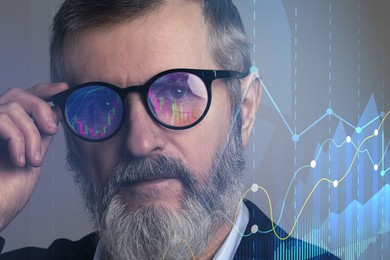 Image of Stock exchange. Trader analyzing data on grey background, closeup. Graphs reflecting in his eyeglasses