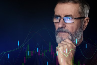 Image of Stock exchange. Trader analyzing data on black background. Graphs reflecting in his eyeglasses