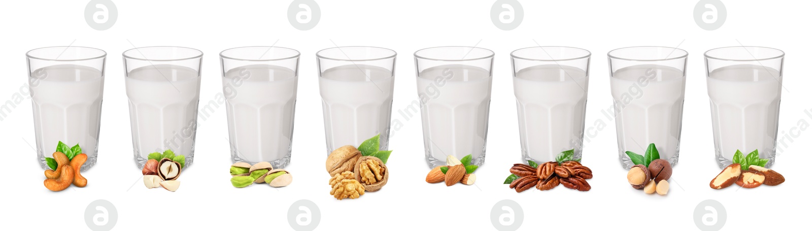 Different types of nut milk in glasses isolated on white, set Image of Different types of nut milk in glasses isolated on white, set