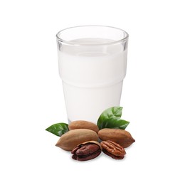 Image of Nut milk in glass and pecans isolated on white
