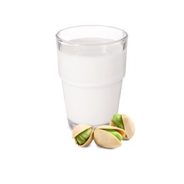 Image of Nut milk in glass and pistachios isolated on white