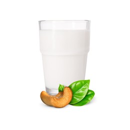 Image of Nut milk in glass and cashews isolated on white