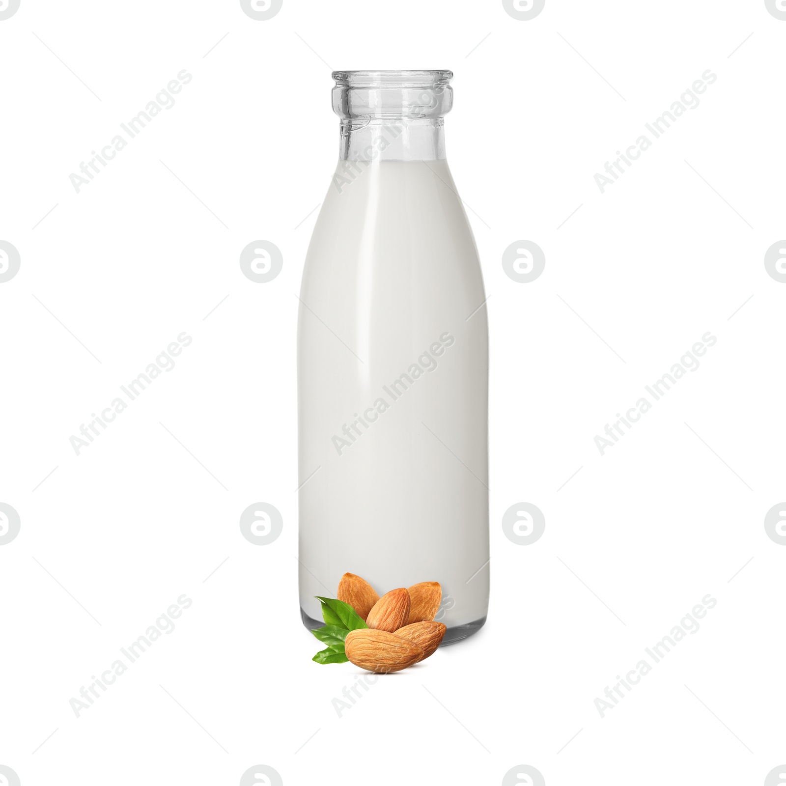 Image of Nut milk in glass bottle and almonds isolated on white