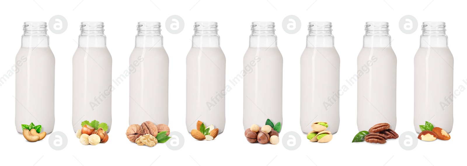 Different types of nut milk in glass bottles isolated on white, set Image of Different types of nut milk in glass bottles isolated on white, set