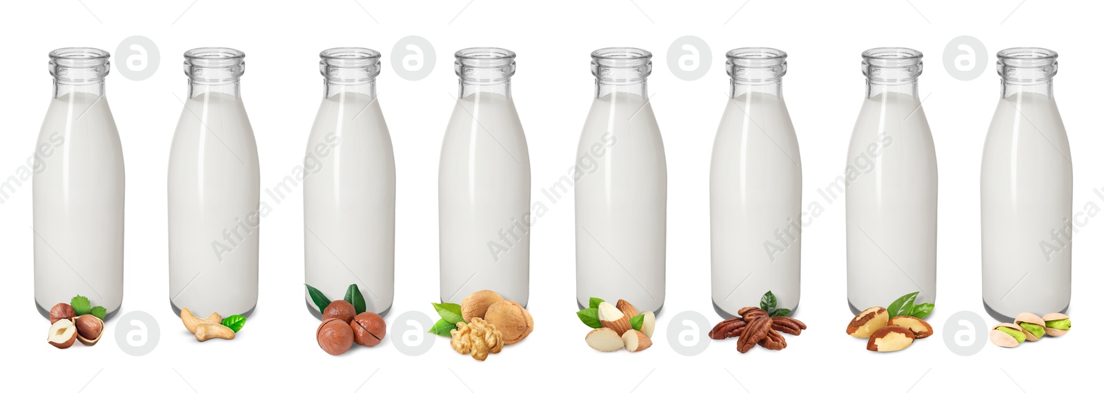 Different types of nut milk in glass bottles isolated on white, set Image of Different types of nut milk in glass bottles isolated on white, set