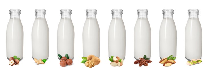 Image of Different types of nut milk in glass bottles isolated on white, set