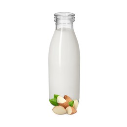 Image of Nut milk in glass bottle and almonds isolated on white