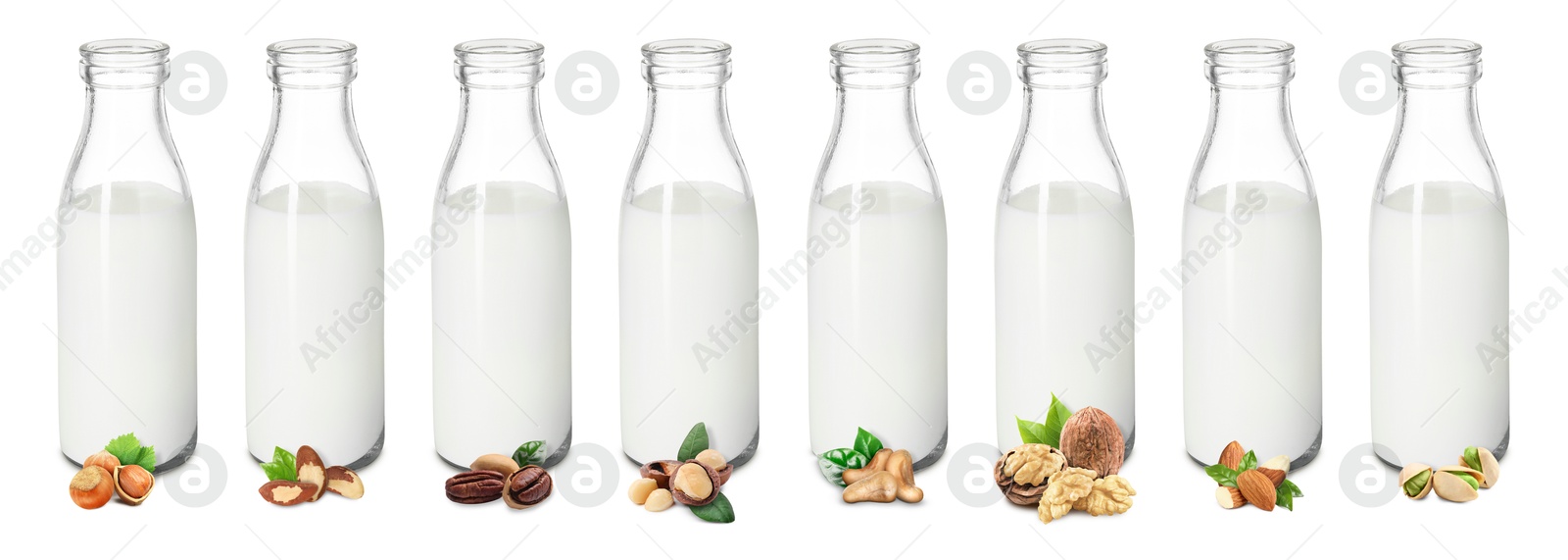 Different types of nut milk in glass bottles isolated on white, set Image of Different types of nut milk in glass bottles isolated on white, set