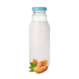 Image of Nut milk in glass bottle and almonds isolated on white
