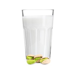 Image of Nut milk in glass and pistachios isolated on white