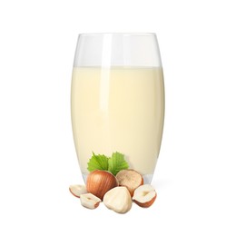 Image of Nut milk in glass and hazelnuts isolated on white