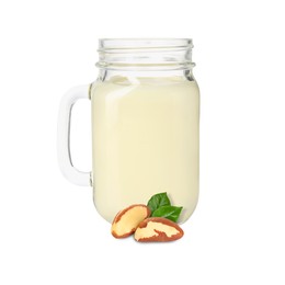 Image of Nut milk in glass jar and Brazil nuts isolated on white