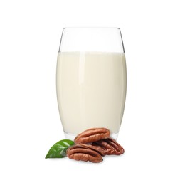 Image of Nut milk in glass and pecans isolated on white