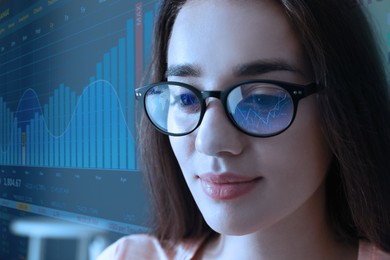 Image of Stock exchange. Trader analyzing data, closeup. Graphs reflecting in her eyeglasses