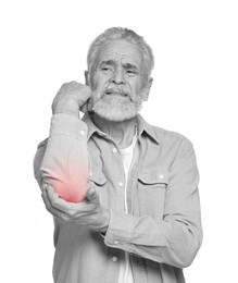 Image of Arthritis. Senior man suffering from pain in elbow on white background. Black and white toning with red color accent