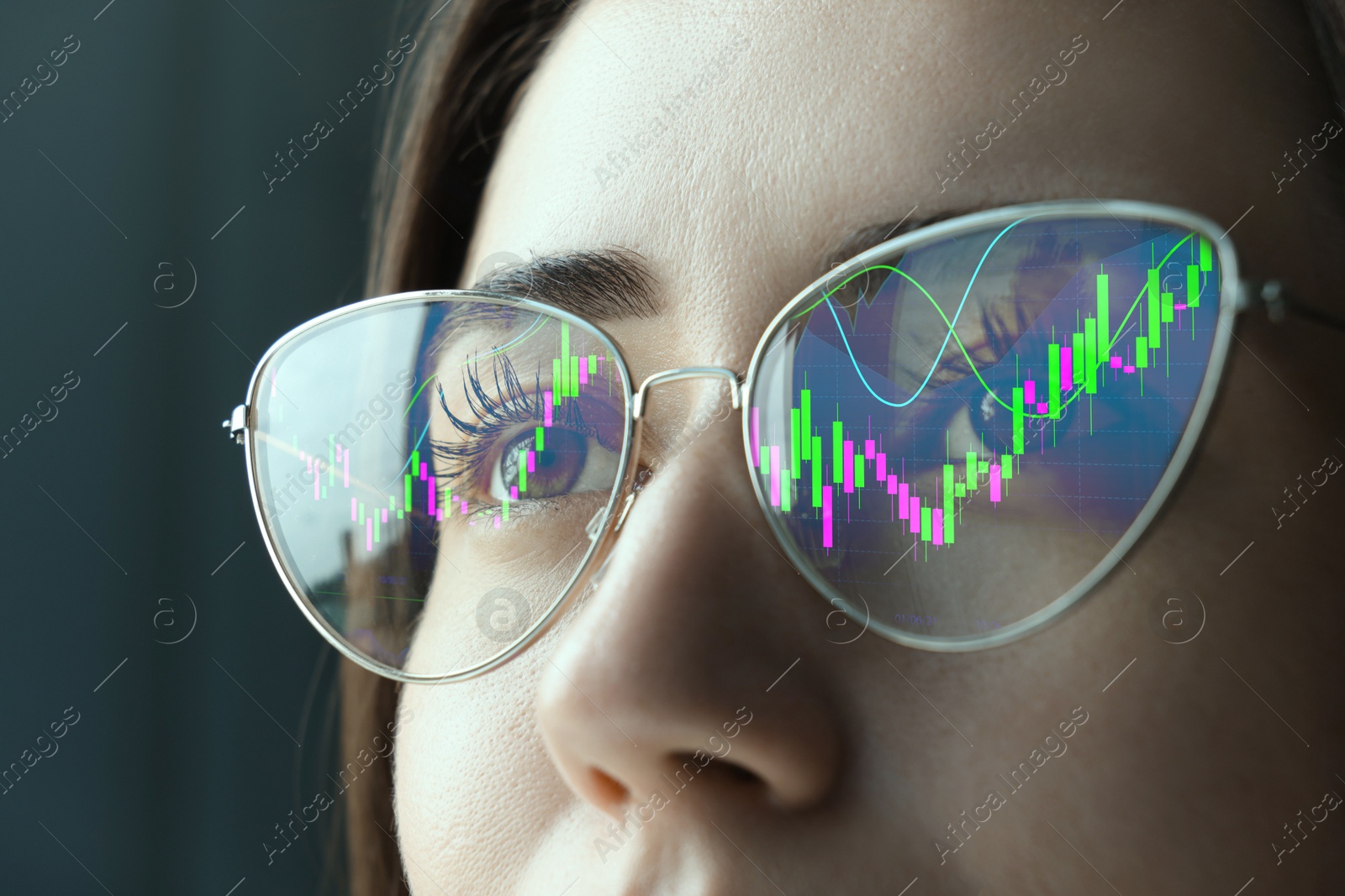 Stock exchange. Trader analyzing data, closeup. Graphs reflecting in her eyeglasses Image of Stock exchange. Trader analyzing data, closeup. Graphs reflecting in her eyeglasses