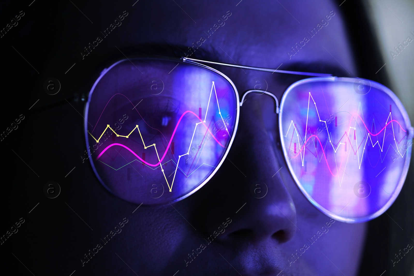 Image of Stock exchange. Trader analyzing data, closeup. Graphs reflecting in her eyeglasses