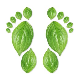 Image of Human footprints made of green leaves on white background, top view. Environmental care, ecology protection, reducing CO2 emission