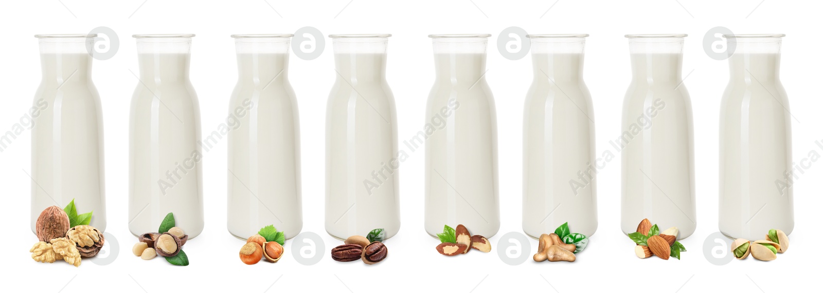 Different types of nut milk in glass bottles isolated on white, set Image of Different types of nut milk in glass bottles isolated on white, set