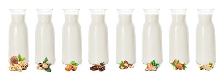 Image of Different types of nut milk in glass bottles isolated on white, set