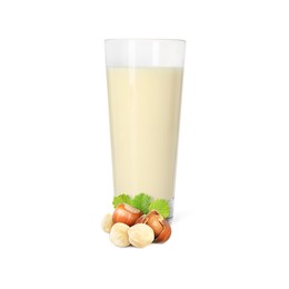 Image of Nut milk in glass and hazelnuts isolated on white
