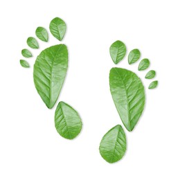 Image of Human footprints made of green leaves on white background, top view. Environmental care, ecology protection, reducing CO2 emission