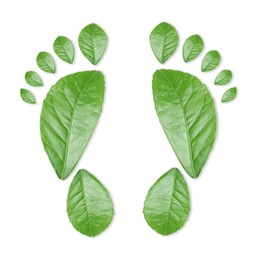 Image of Human footprints made of green leaves on white background, top view. Environmental care, ecology protection, reducing CO2 emission