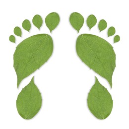 Image of Human footprints made of green leaves on white background, top view. Environmental care, ecology protection, reducing CO2 emission