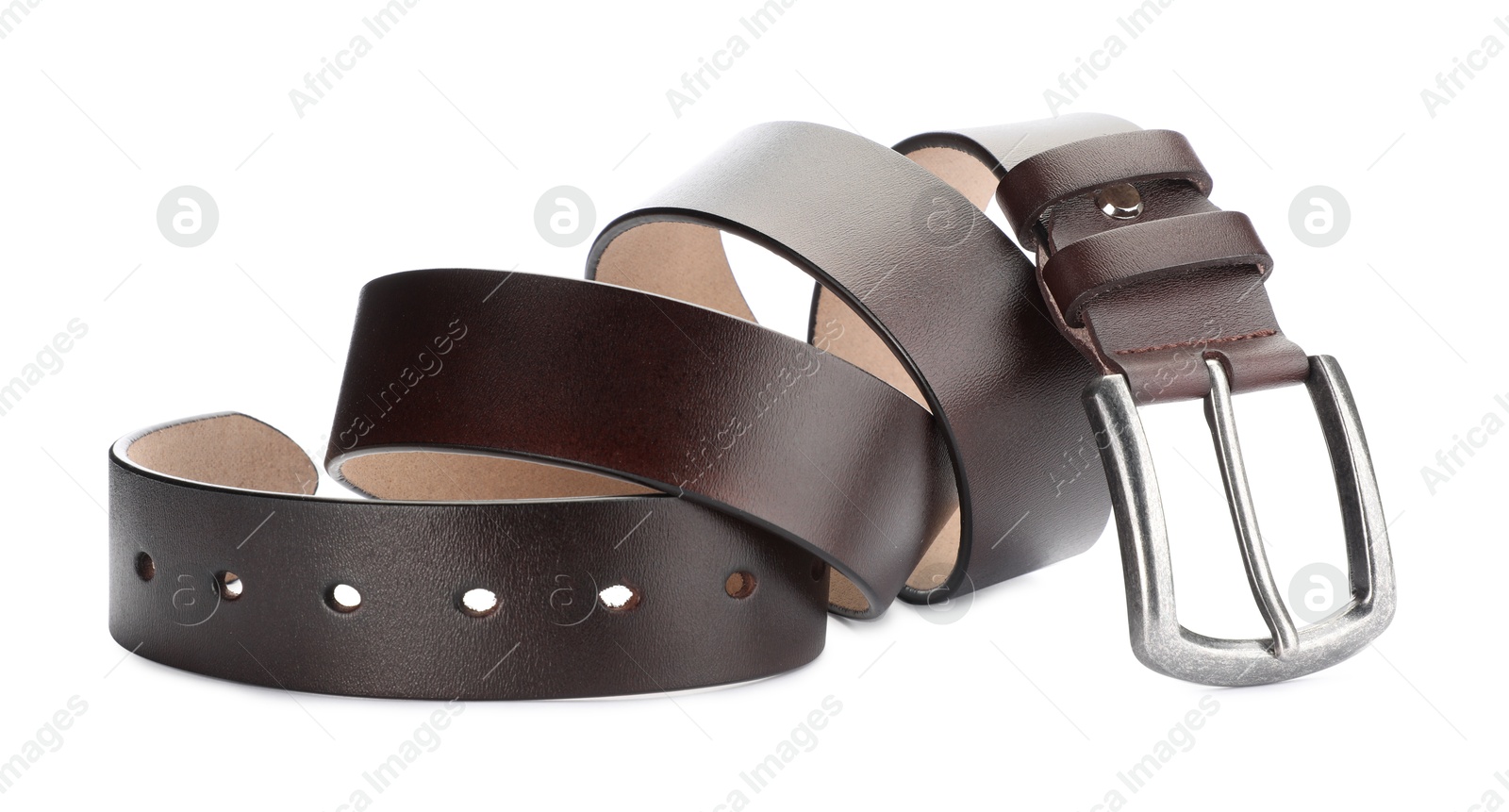 One brown leather belt isolated on white Photo of One brown leather belt isolated on white