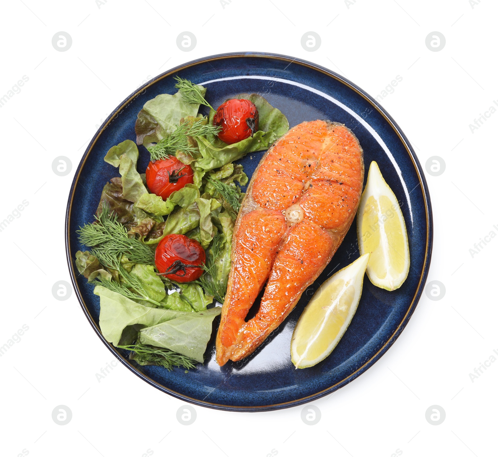 Seafood. Tasty salmon steak, salad and lemon isolated on white, top view Photo of Seafood. Tasty salmon steak, salad and lemon isolated on white, top view