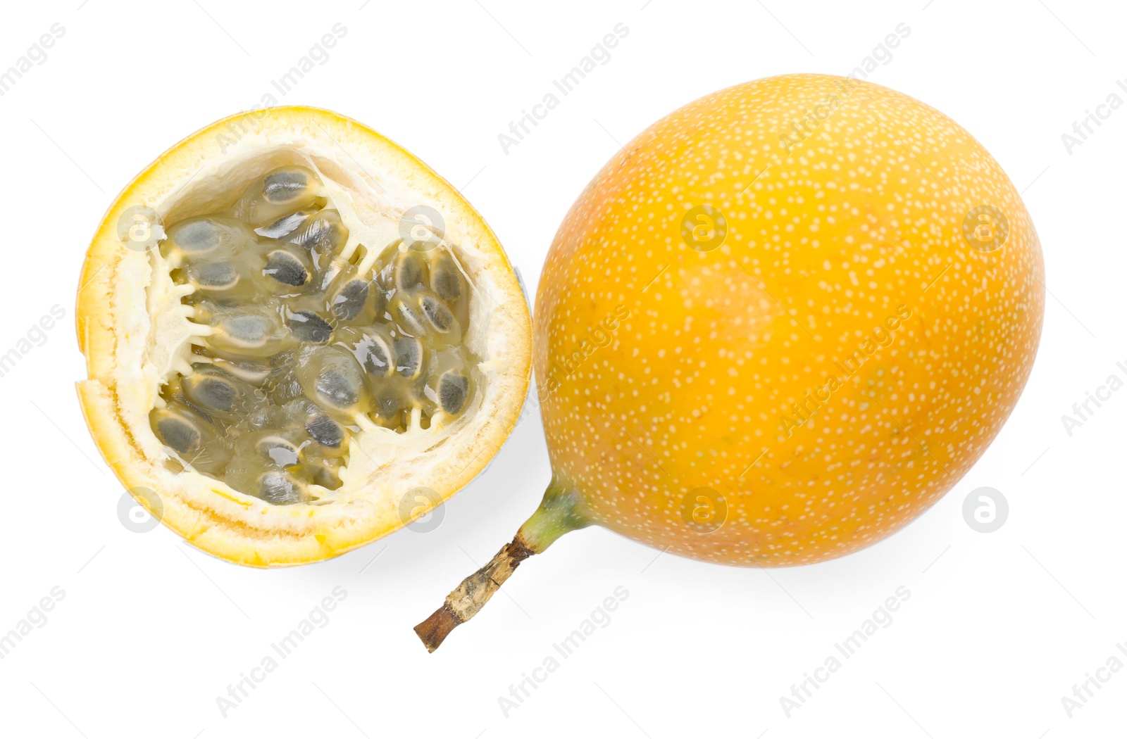 Ripe yellow passion fruits isolated on white, top view Photo of Ripe yellow passion fruits isolated on white, top view