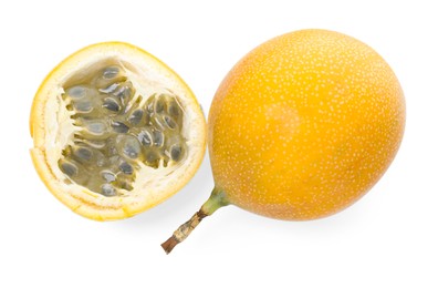 Photo of Ripe yellow passion fruits isolated on white, top view