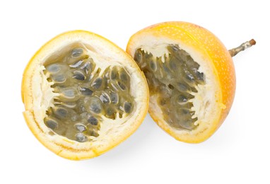 Photo of Pieces of ripe yellow passion fruit isolated on white