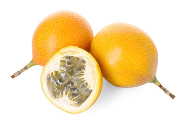 Photo of Ripe yellow passion fruits isolated on white