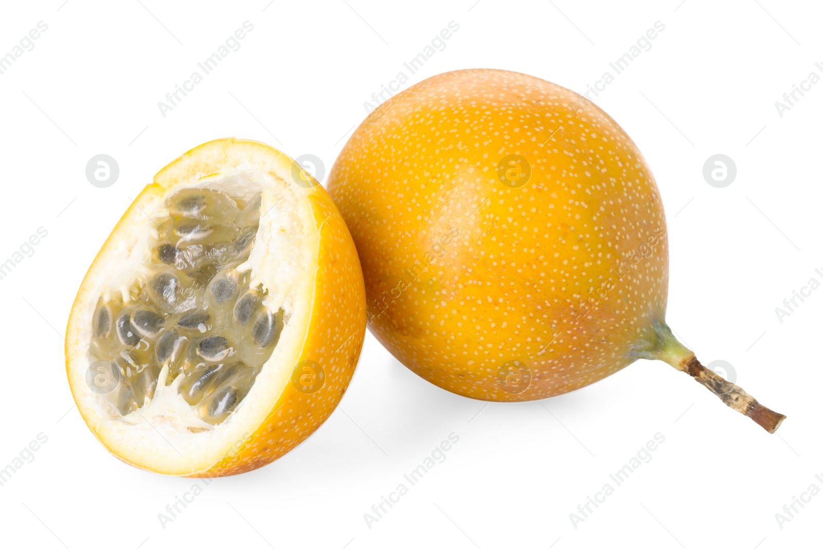 Ripe yellow passion fruits isolated on white Photo of Ripe yellow passion fruits isolated on white