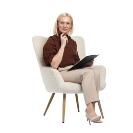 Photo of Professional psychologist with clipboard in armchair on white background