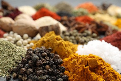 Photo of Different aromatic spices as background, closeup view