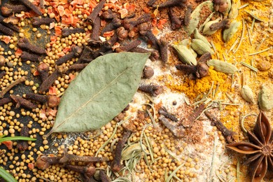 Photo of Different aromatic spices as background, closeup view