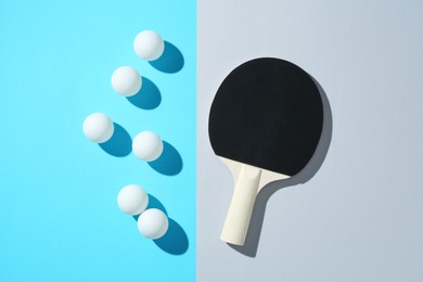 Photo of Ping pong racket and balls on color background, flat lay