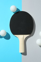 Photo of Ping pong racket and balls on color background, flat lay
