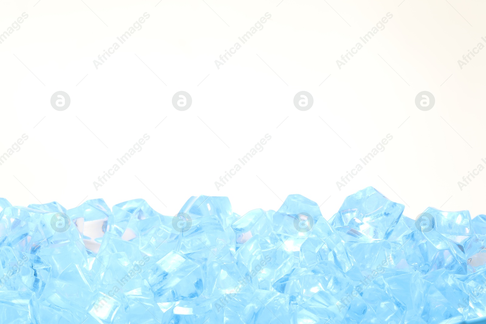 Cubes of clear ice on white background Photo of Cubes of clear ice on white background