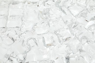 Photo of Cubes of clear ice as background, closeup