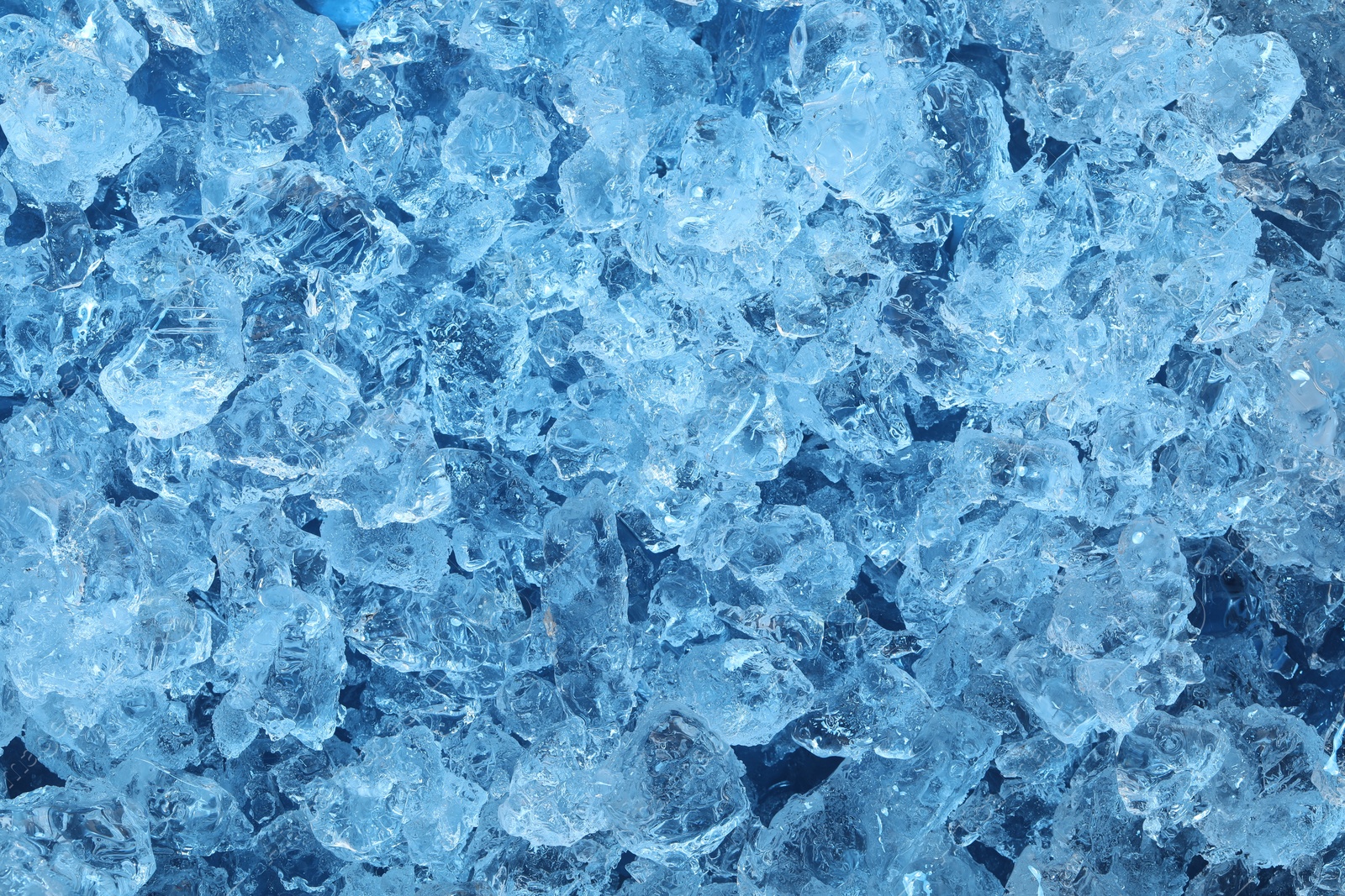 Cubes of clear ice as background, closeup Photo of Cubes of clear ice as background, closeup