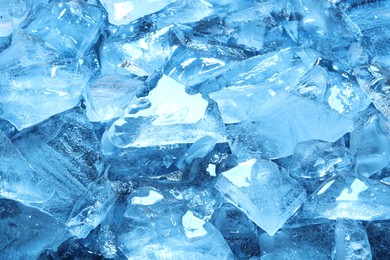 Photo of Cubes of clear ice as background, closeup