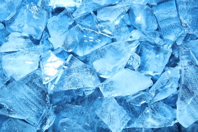 Photo of Cubes of clear ice as background, closeup