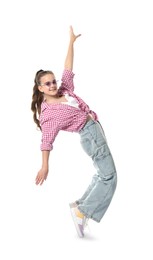 Photo of Girl in stylish clothes and sunglasses dancing on white background
