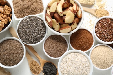 Photo of Different superfoods on white background, flat lay